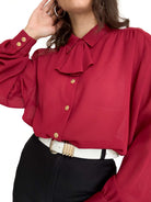 Front view styled tucked into jeans