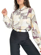 Front view styled tucked into jeans