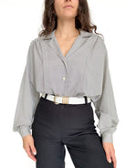 Front view styled tucked into jeans